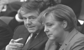 The master (Josef Ac­ker­mann, Chef der Deutschen Bank) and his voice (rechts Angela Merkel, „Chef“ der BRD)